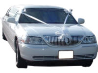 Cars for Stars (Cambridge) - Wedding Limo. White Lincoln stretched wedding limousine with white ribbons